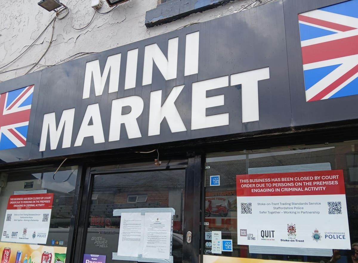 Closure order notices displayed outside UK Mini Market in Hanley